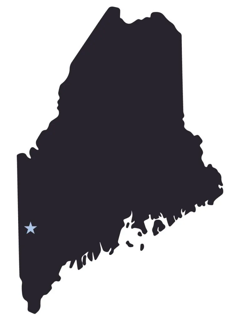 A silhouette of the state of Maine with Fryeburg indicated with a blue star.